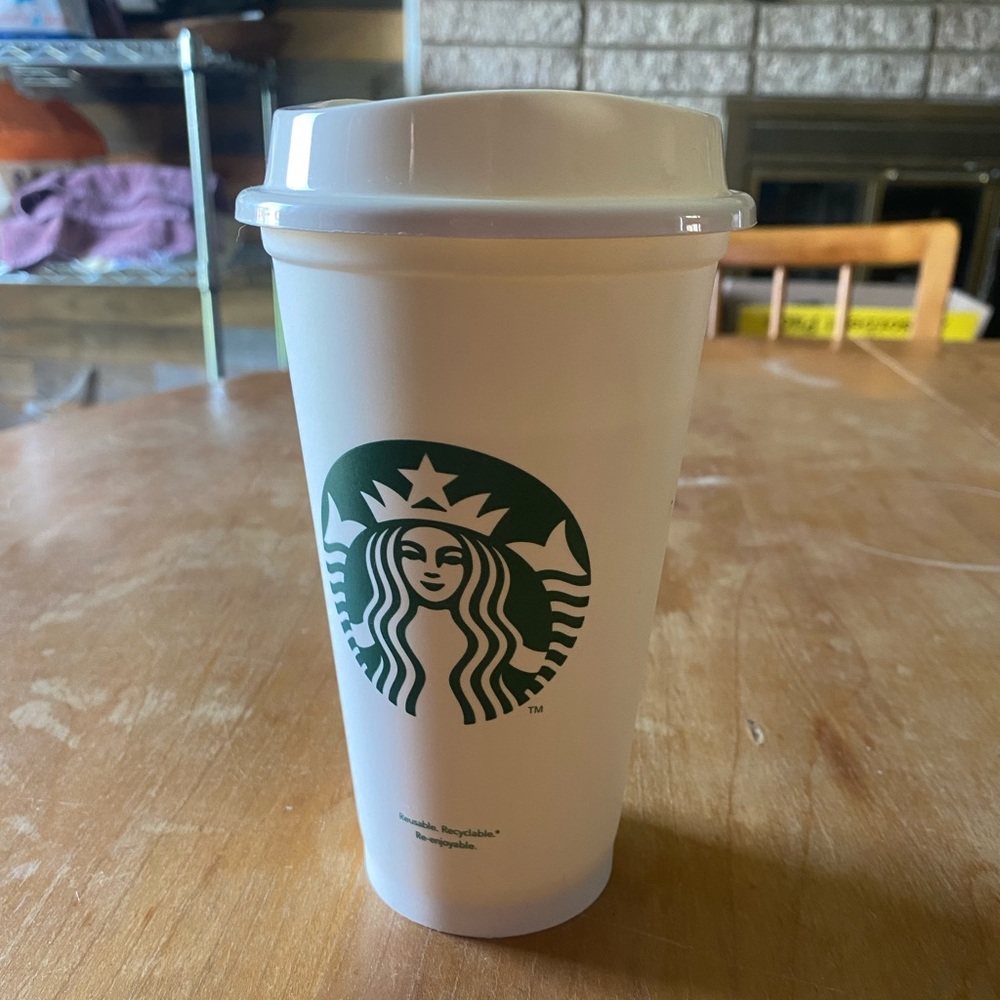 Starbucks re-useable warm cup.